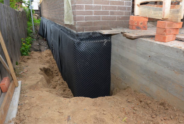 SJ Waterproofing Pros technician performing targeted Waterproofing assessment in Clifton Springs, NY